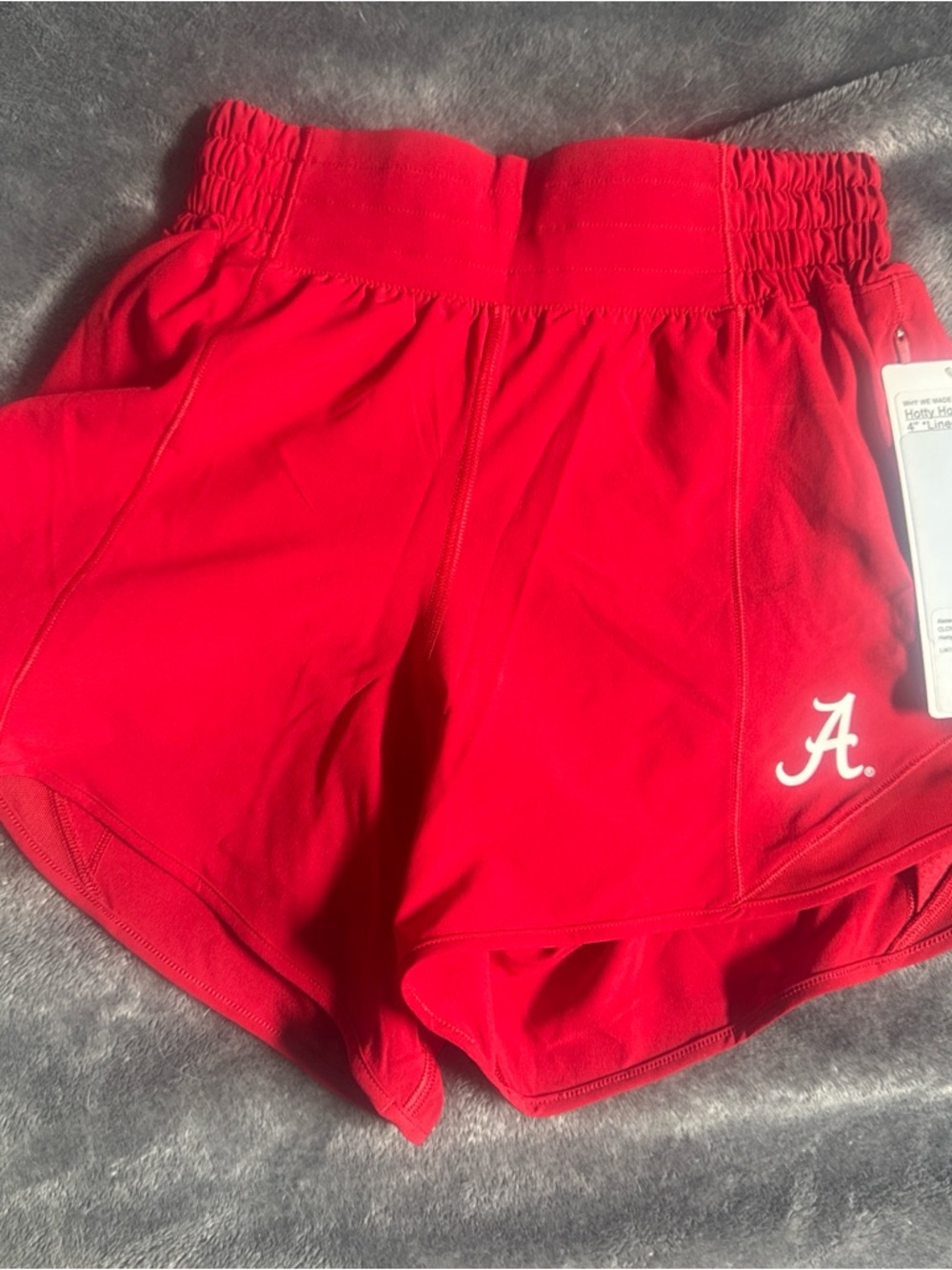 lululemon athletica Bright Red Athletic Shorts with White Script 'A' Logo